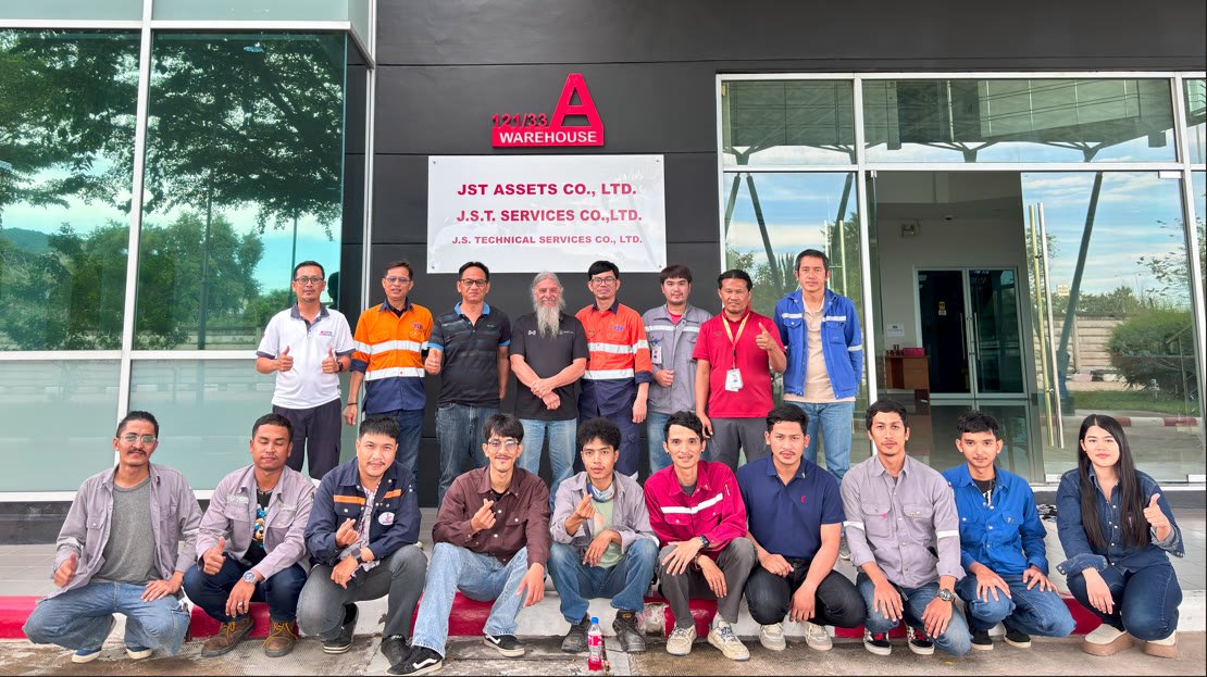 A Mantl-Ex training cohort gathered outside a partner facility in Thailand.